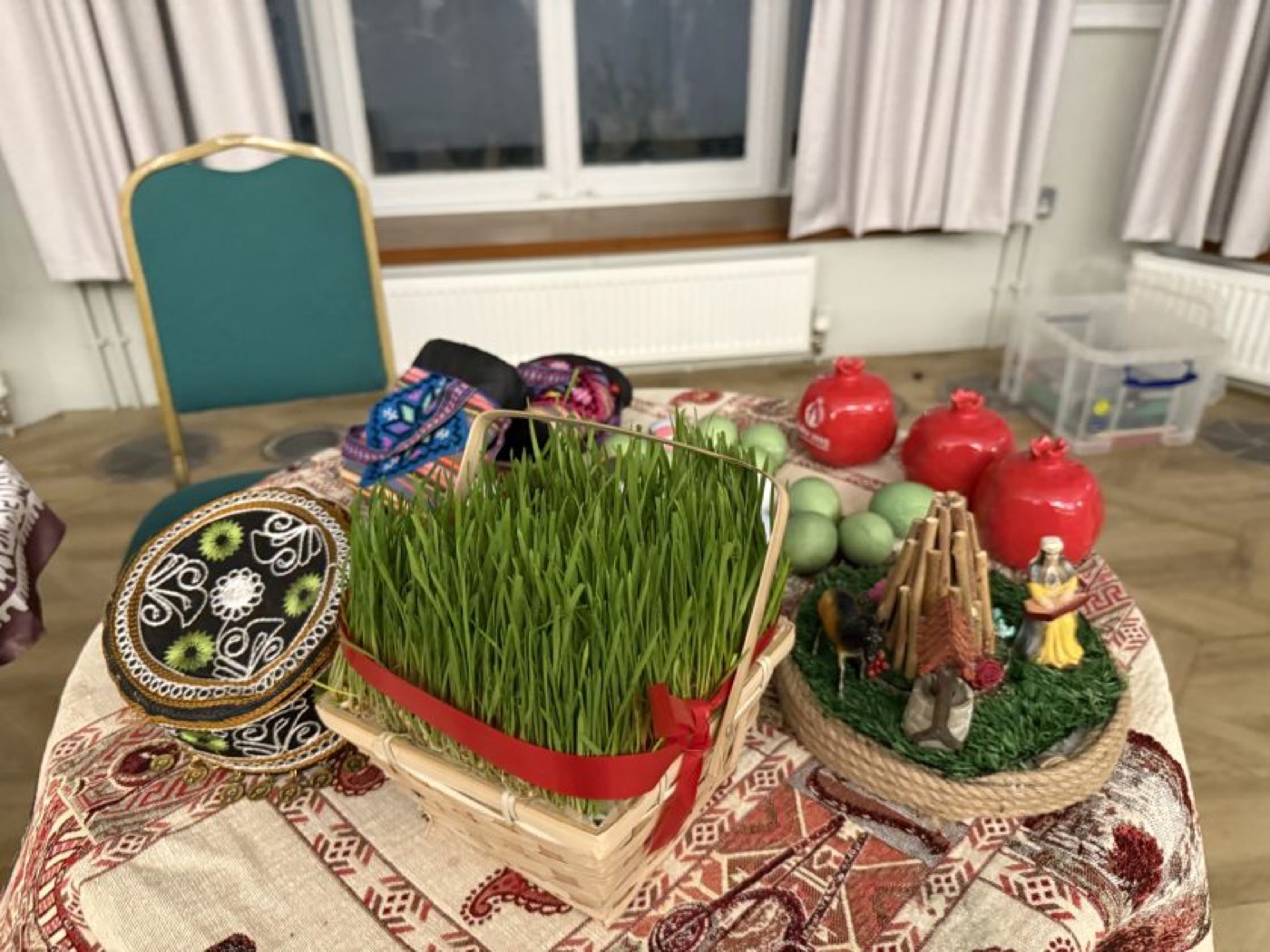 Səməni, candles and pomegranates arranged for Novruz