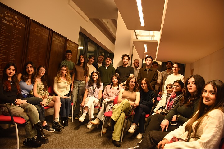 Society members gathered at a Queen Mary Students' Union meeting